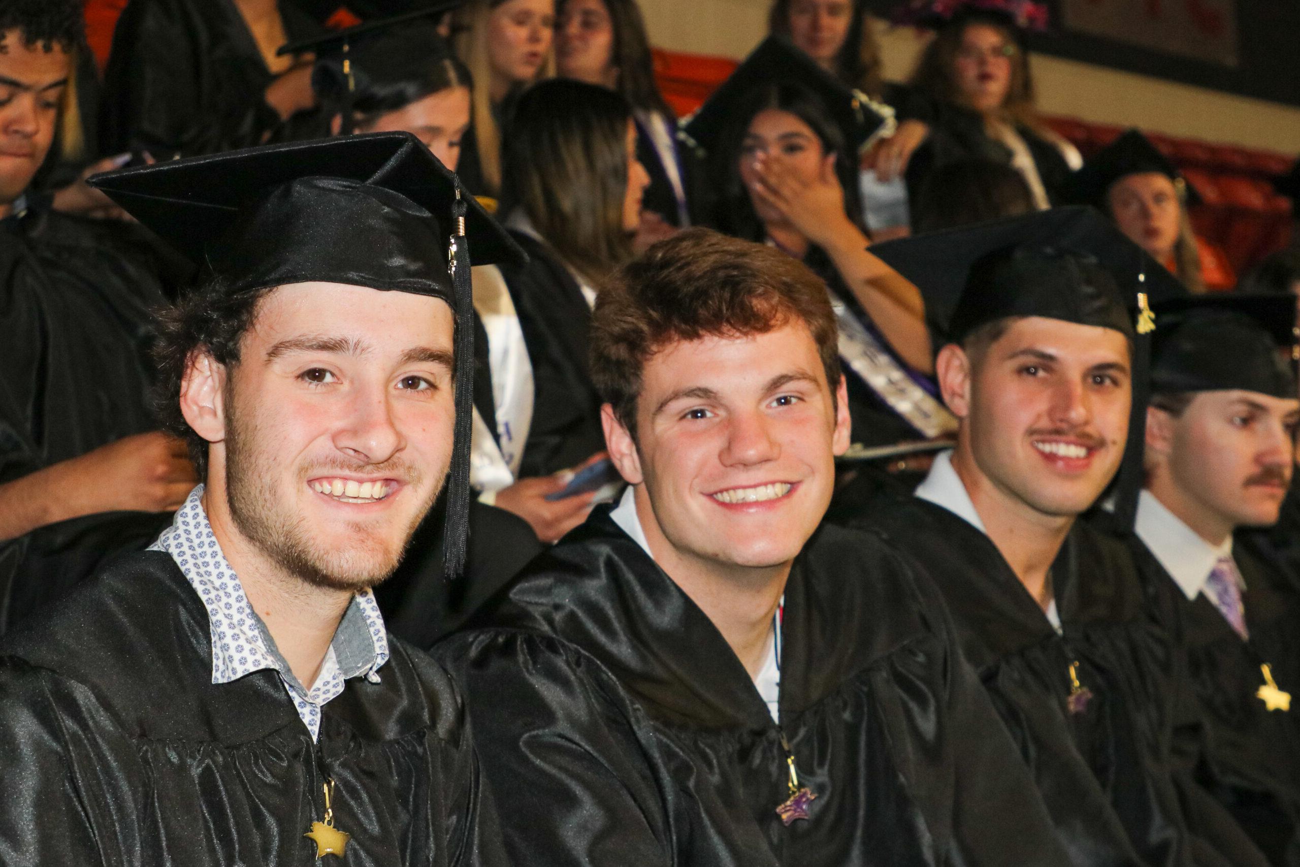 Group of men in graduation attire