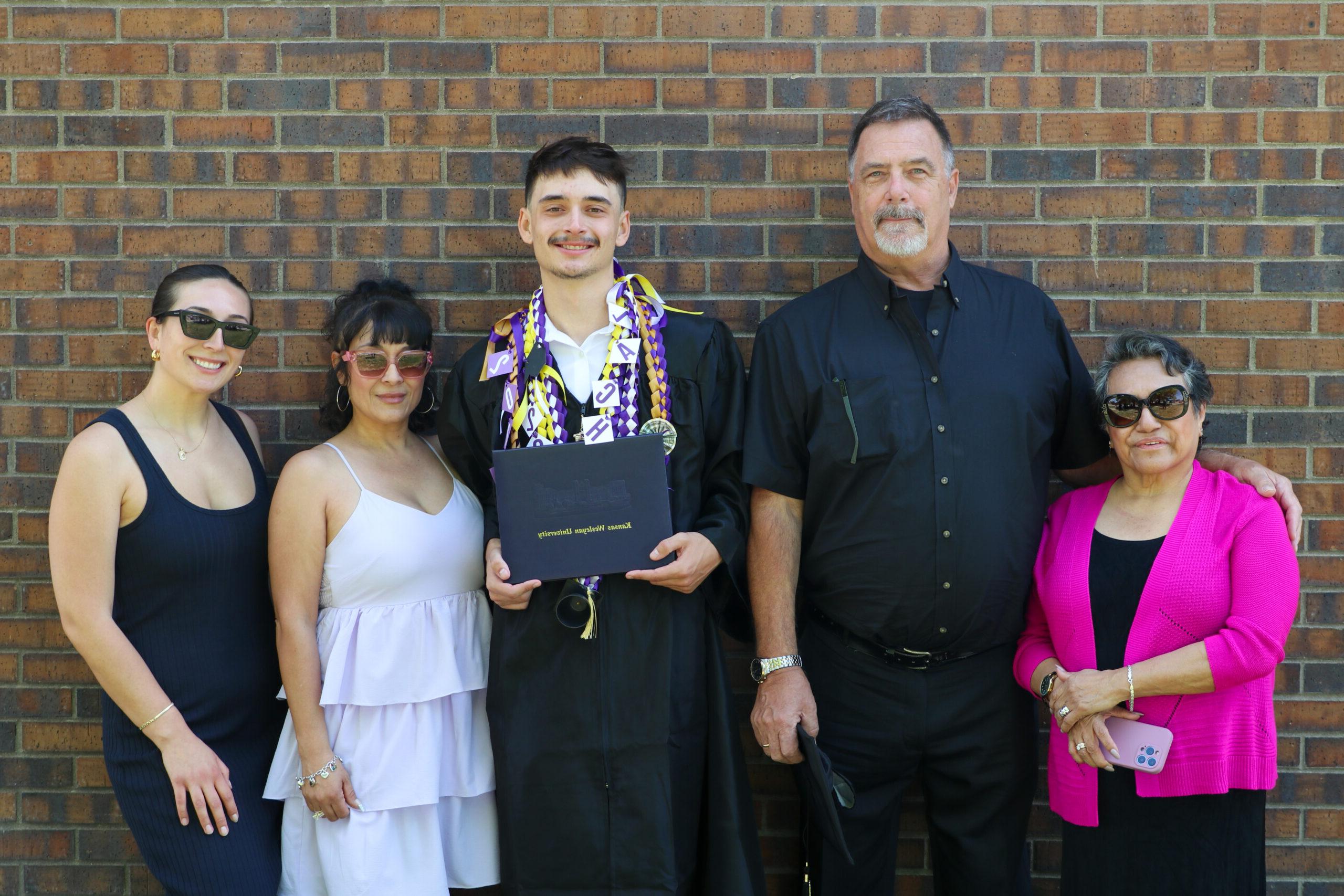 Family with graduating man